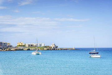White sail boats at Otranto coast, Italy