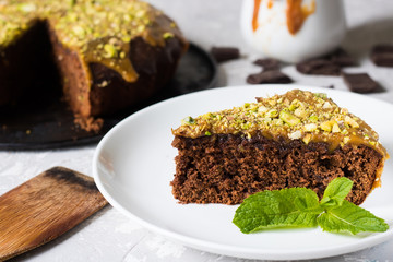 Chocolate cake with pistachios and salted caramel