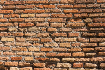 old fashioned brick wall texture in warm lightning