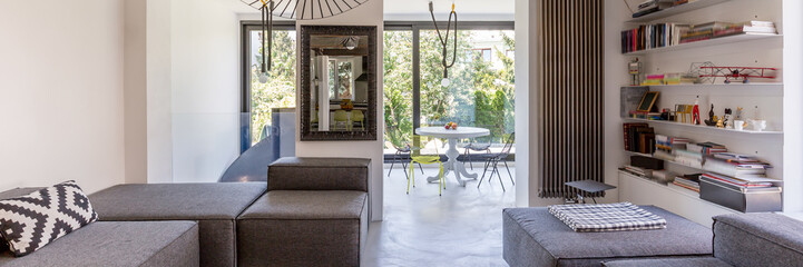 Bright living room with access to dining area