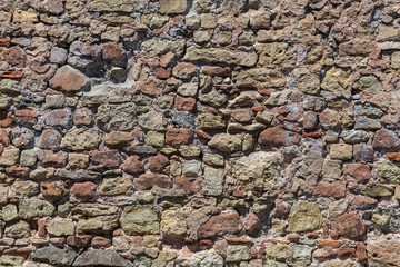 Steinmauer aus alten Steinen Struktur