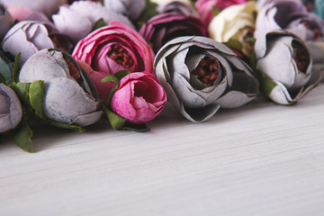 Beautiful artificial flowers variety, copy space