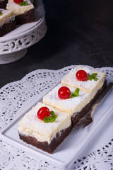 chocolate cream cake with cherries