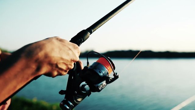 Fishing, hobby and recreational concept - fishermen