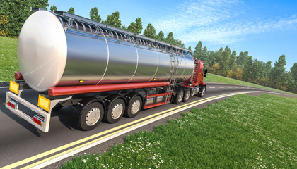 Rear View of a Red Tanker Truck Moving on the Road