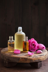 Obraz na płótnie Canvas Essential oil and rose flowers aromatherapy spa perfumery