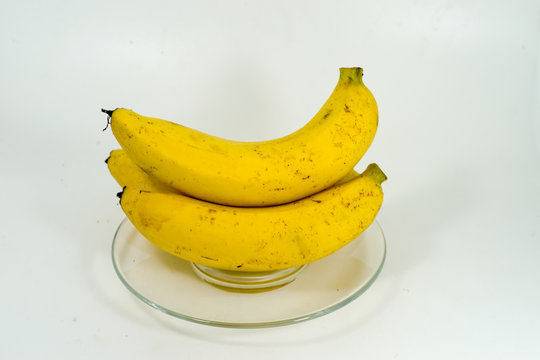 Fresh banana in a glass dish .