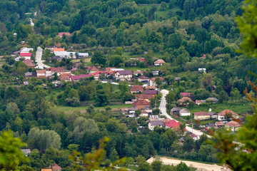 Fototapeta na wymiar Aerial shot of a village in mountains