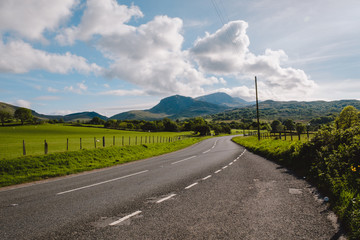 Fototapeta na wymiar Road towards the Mountains - Welsh countryside