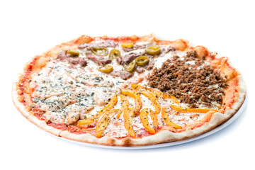 Sliced meat pizza with chicken, beef, minced meat and sweet pepper on plate