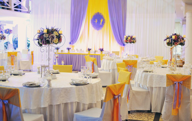 holiday table with a vase with fresh flowers