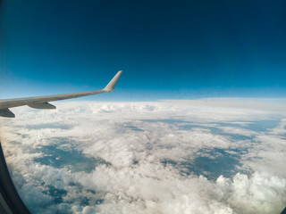 Fototapeta premium Aerial view from aircraft or airplane window or illuminator