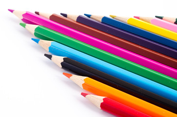 Colored pencils on white background