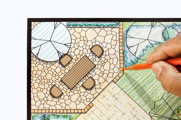 Landscape architect design patio in backyard garden plan.