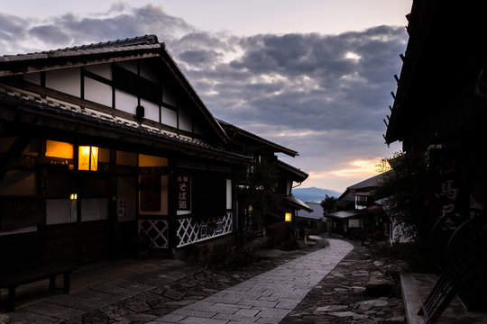 Traditional wooden house during the sunset in a small rural village par of the pilgrimage route Magome-juku Japan