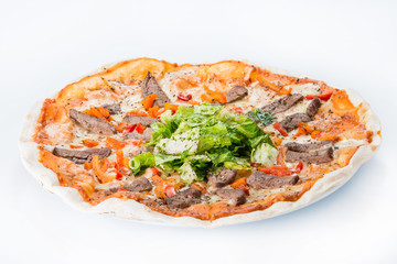 Pizza with beef and salad on a light background