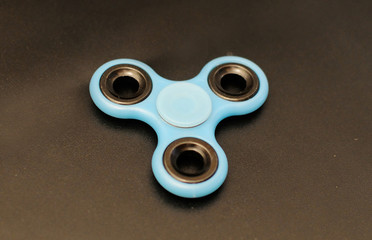 Fidget spinner on dark background