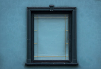 Closed Green Window With Green Wall