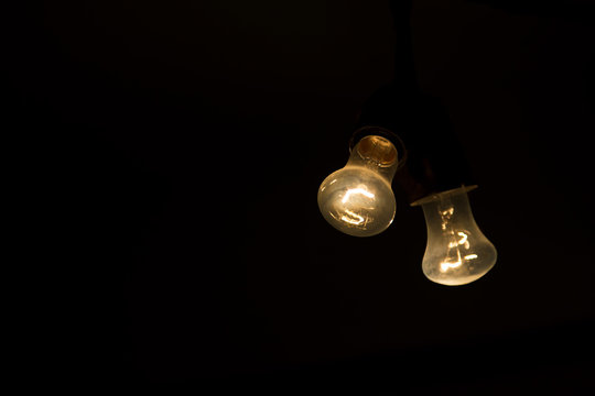 Two light bulb in the dark