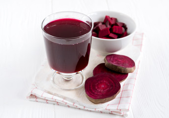 Beetroot smoothie in glass. Fresh beetroot juice in glass Healthy detox drink White background