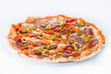 Sliced spicy Italian pizza with pepperoni and cheese. Side view