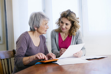 Fototapeta premium Senior woman with her carer