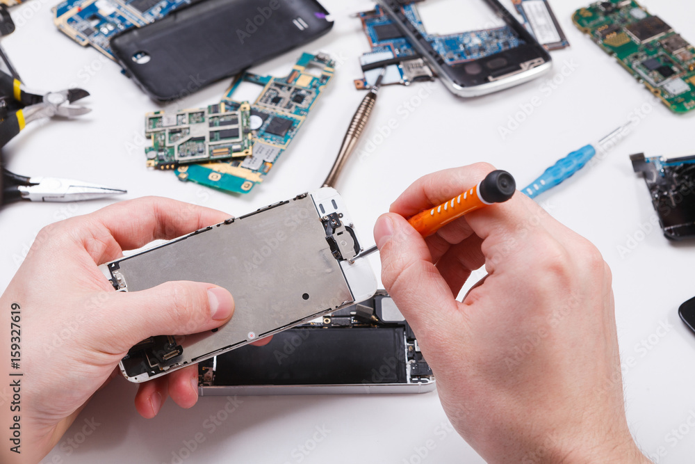 Poster repairman disassembling phone with screwdriver