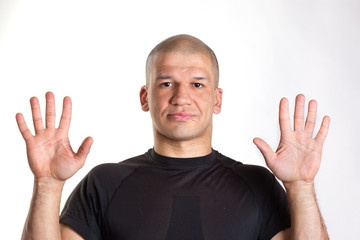 Portrait of a cheerful man showing palms