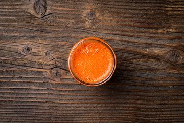 Fresh juice on an old wooden table