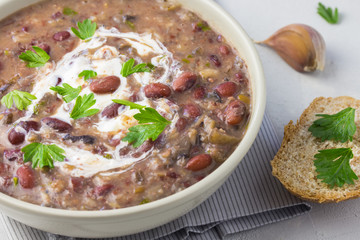  Classic bean and ham soup with garlicky bread. 