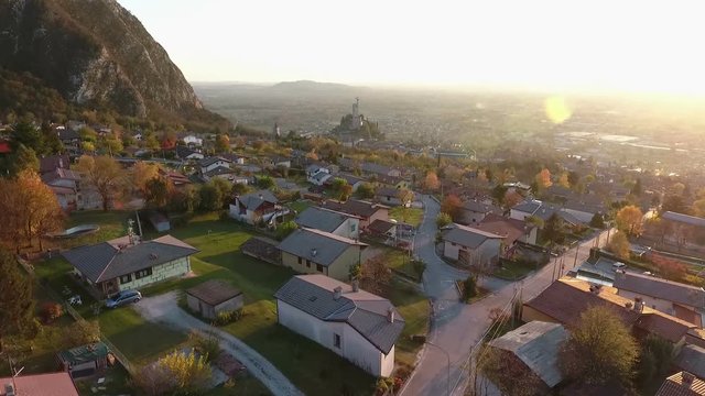 Flight over a town with cathedral in Northern Italy