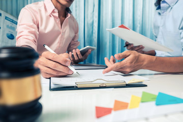 Business man discussing very seriously in the workplace, teamwork hipster vintage style.