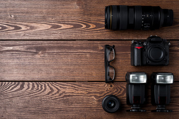 Photography equipment on wooden table