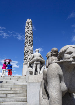 Vigeland's Monolith and statues Wheel of Life at the Vigeland Sculpture Park (Frogner Park), Oslo, Norway.