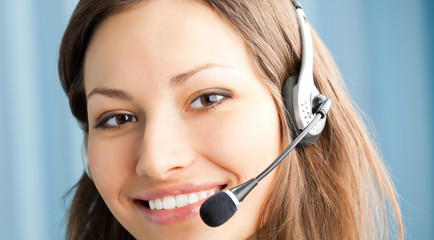 Cheerful smiling support phone operator at office