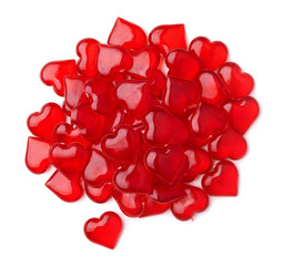 Group of red plastic hearts isolated