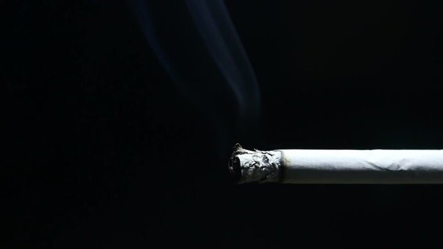 smoke with Cigarette on isolated black