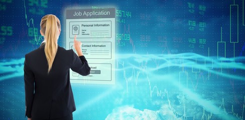 Composite image of business woman pointing somewhere