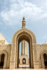 Fototapeta na wymiar Arches and Tower, Sultan Qaboos Grand Mosque, Oman