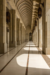 Fototapeta premium Sunny Courtyard Colonnade at Oman Grand Mosque