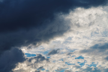 Cumulus clouds and the dark blue sky