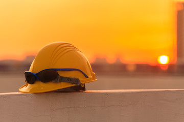 Fototapeta na wymiar Construction helmet and Construction Tools on Construction site