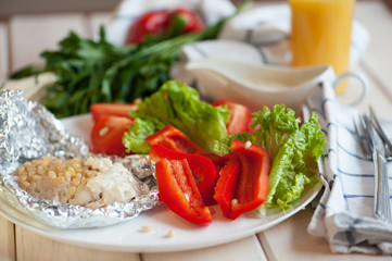 Baked fish with pine nuts