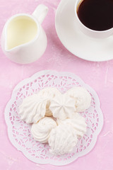 Zephyr or marshmallow with coffee. Top view