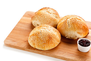 Fresh baked buns on white background 