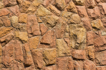 Stone wall texture in warm colors