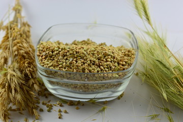 Green buckwheat in a bowl