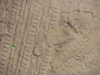 Abstract tire tracks on sand. Background and texture