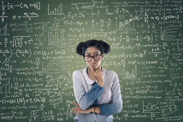 Portrait of businesswoman with arms crossed