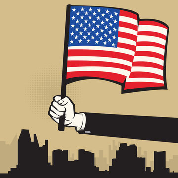 Hand holding American flag. USA Flag